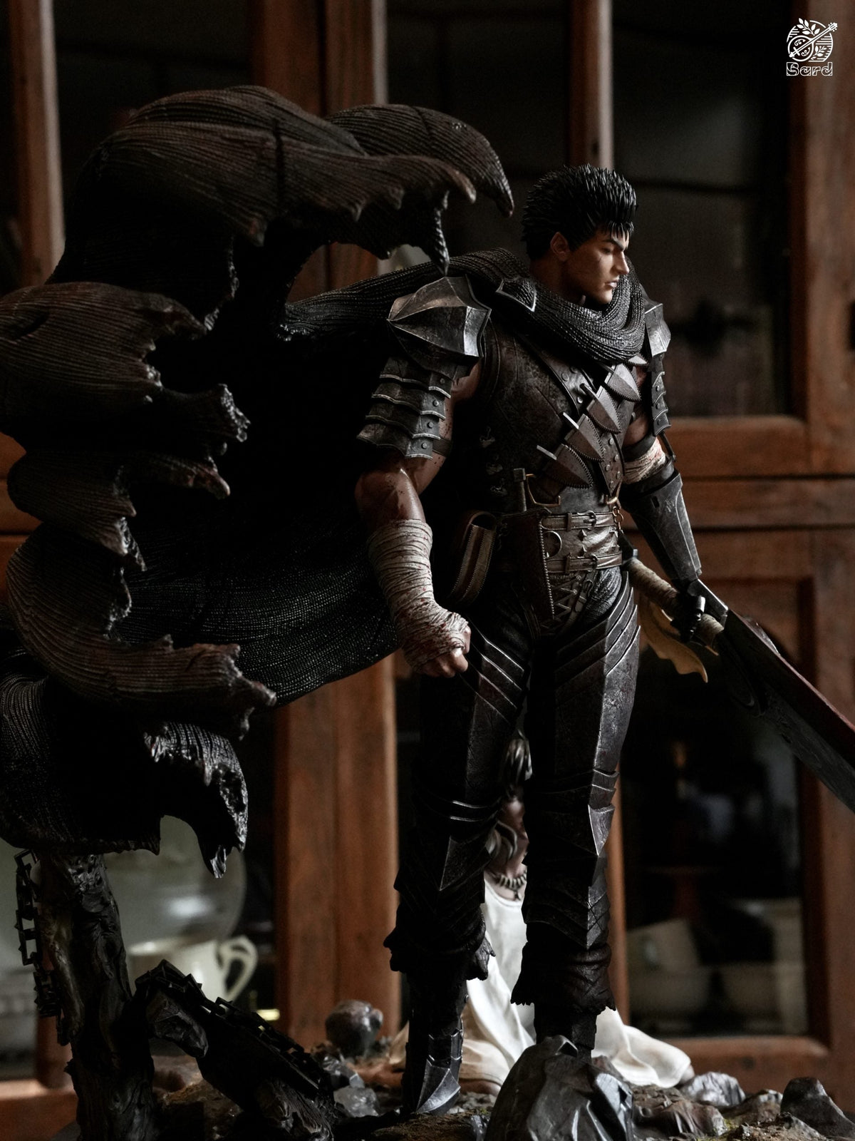 Detail of layered plate armour and leather strapping